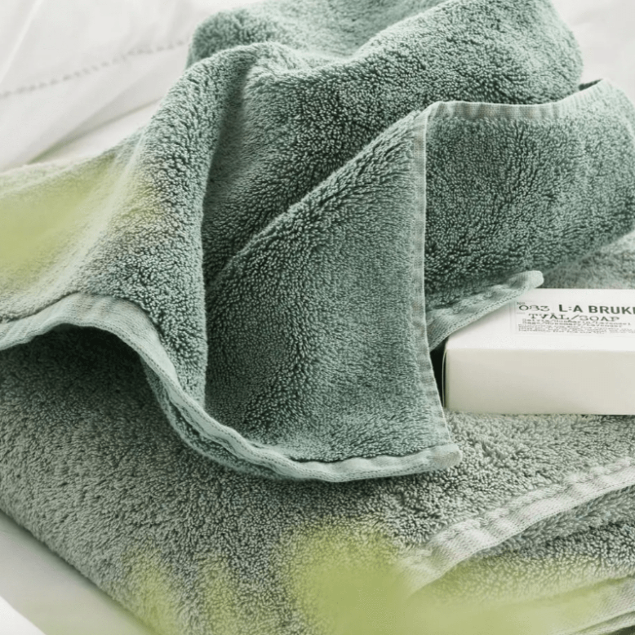 https://www.wellappointedhouse.com/cdn/shop/files/100percent-organic-cotton-sage-green-loweswater-towels-bath-towels-the-well-appointed-house-5.png?v=1691700141