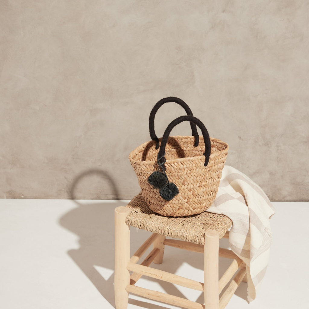 Mini St Tropez Pom Pom Straw Tote in Black - The Well Appointed House